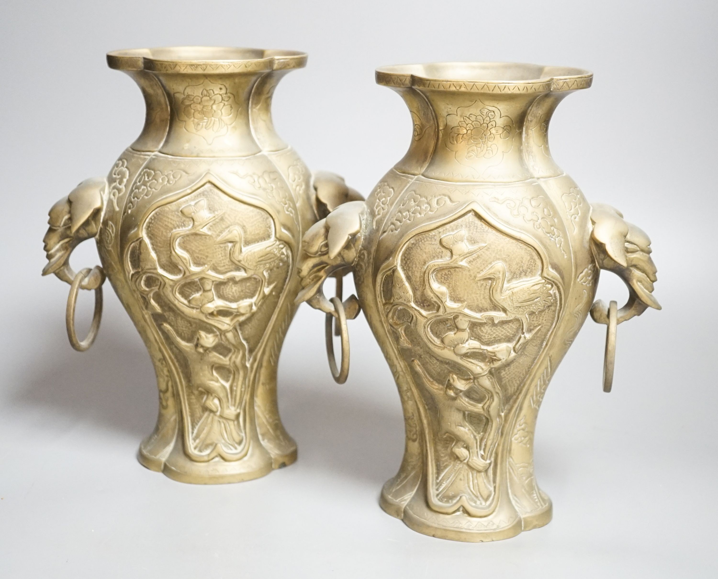 A pair of Chinese bronze vases 24cm